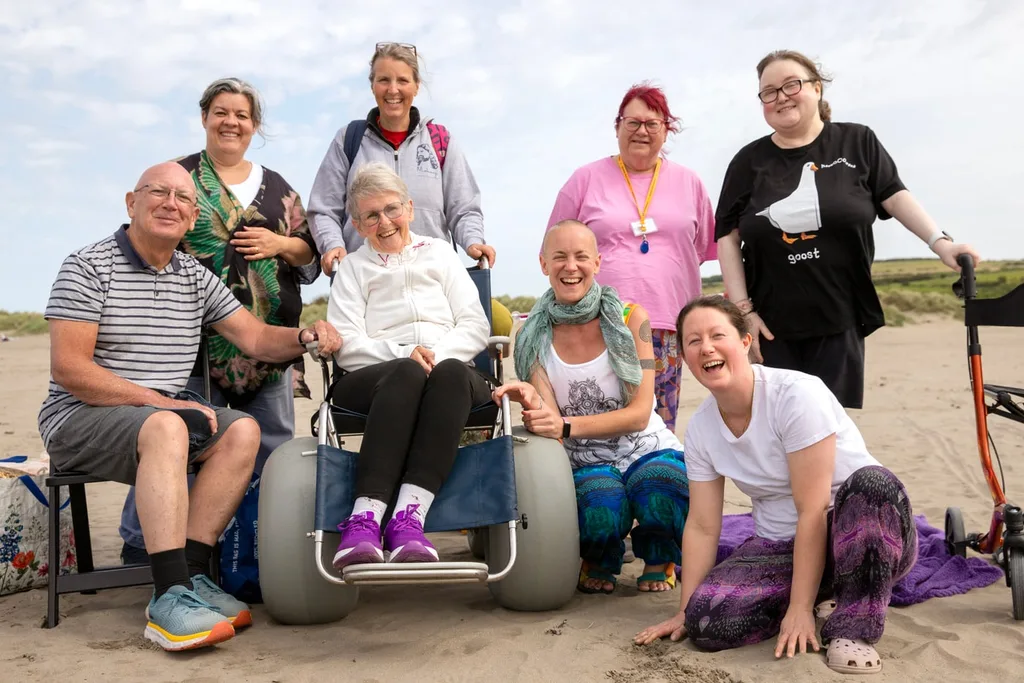 Patients, nurses and volunteers together on the beach at Poppit Sands.