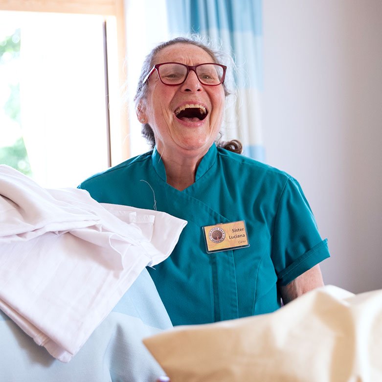 Sister Luciana organising laundry at Skanda Vale Hospice.
