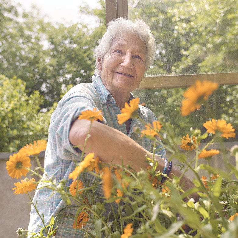 Photo of resident gardening